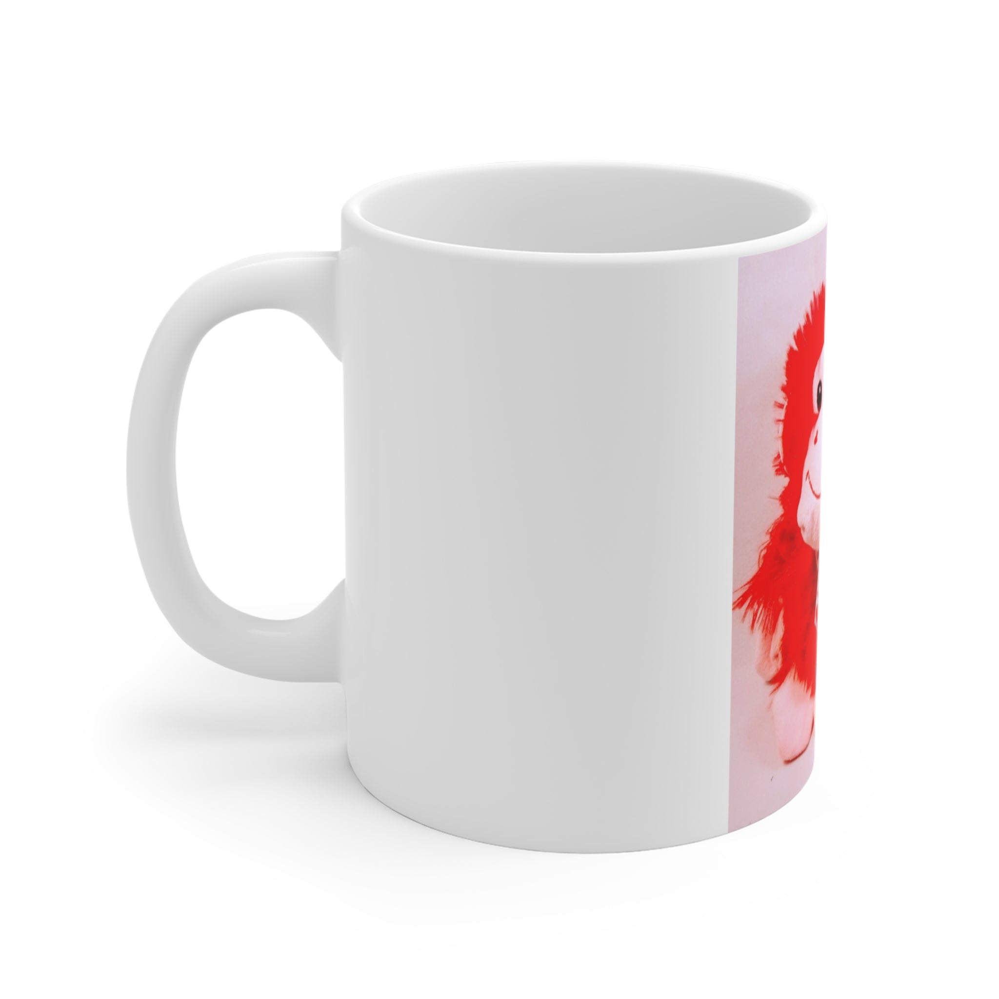 White mug with a red and white design on a white background