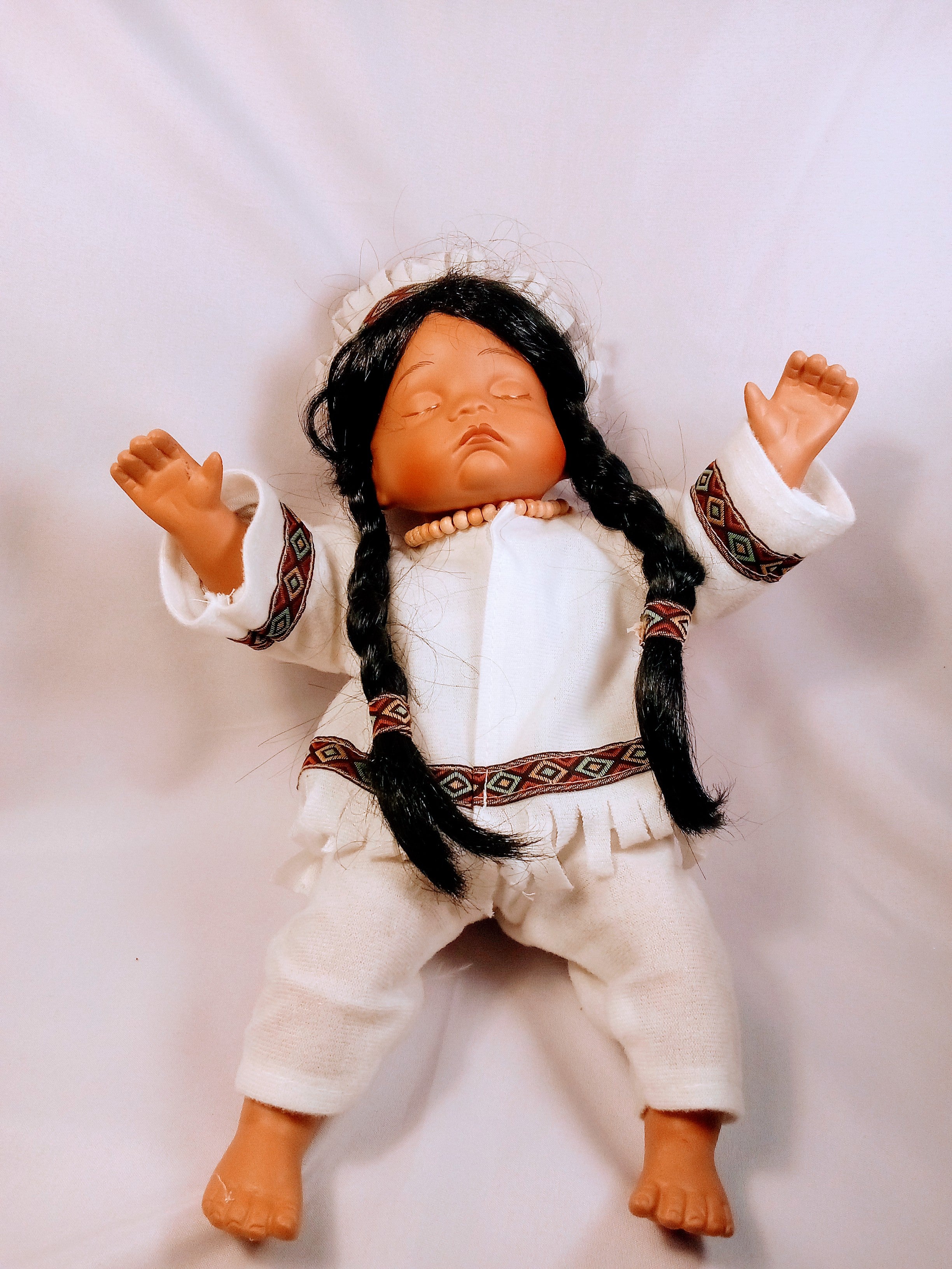Native American Porcelain Doll with Beautiful Braided Hair, Sleepy Eyes, Charming Collectible, Adorn your Collection