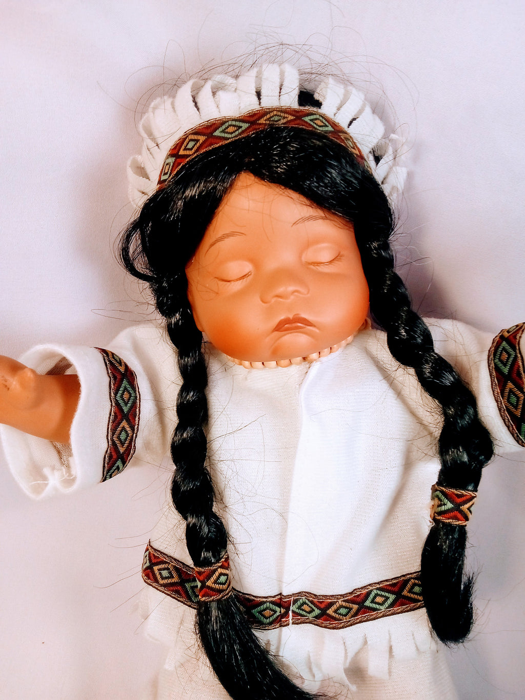 Native American Porcelain Doll with Beautiful Braided Hair, Sleepy Eyes, Charming Collectible, Adorn your Collection