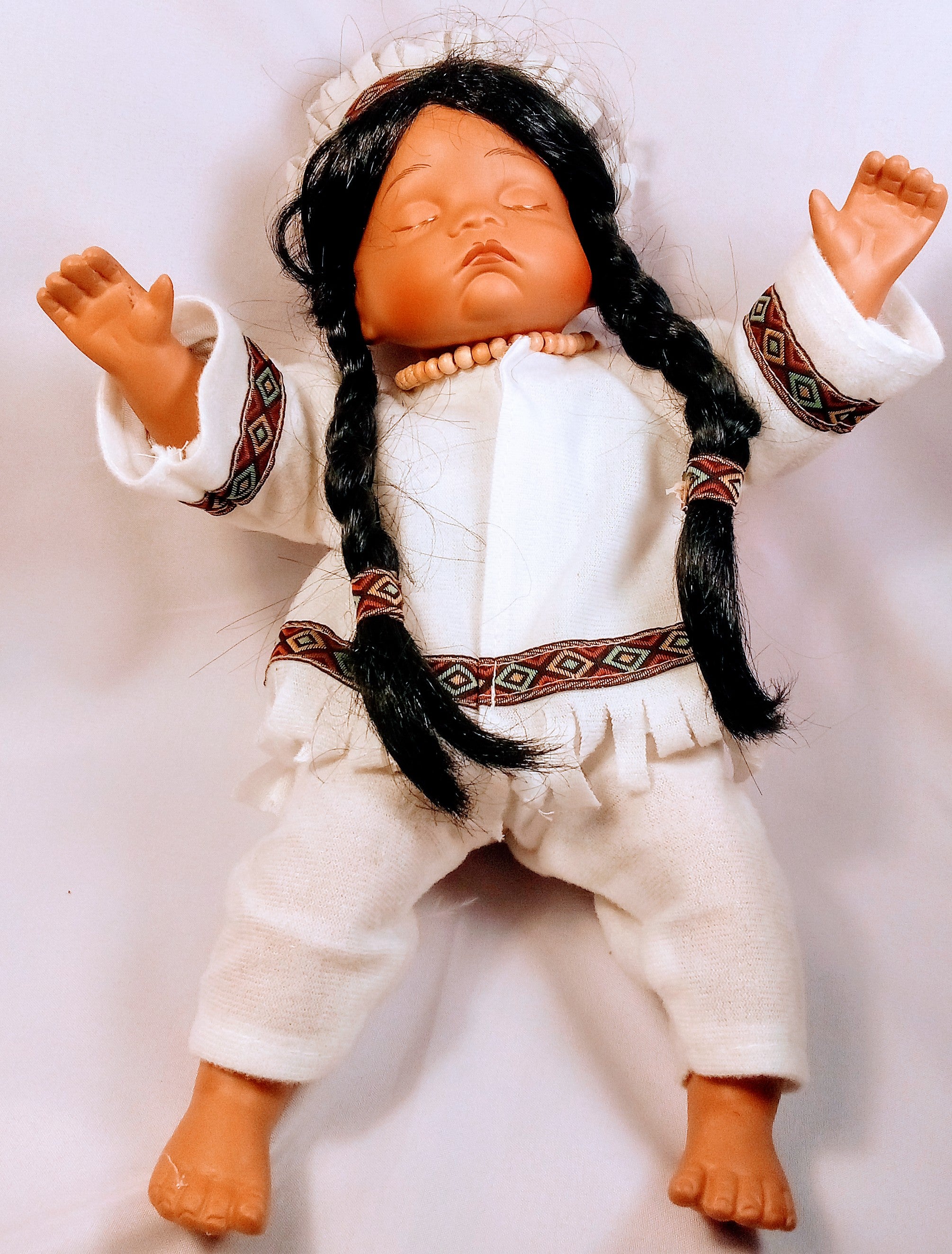 Native American Porcelain Doll with Beautiful Braided Hair, Sleepy Eyes, Charming Collectible, Adorn your Collection